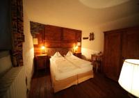 Łóżko lub łóżka w pokoju w obiekcie Eco Chalet Maison Dominique