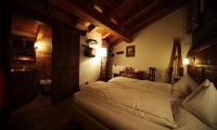 Łóżko lub łóżka w pokoju w obiekcie Eco Chalet Maison Dominique