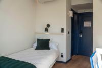 Postel nebo postele na pokoji v ubytování Hotel Alda Jolio Jaca