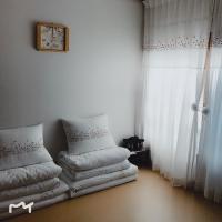 Ein Sitzbereich in der Unterkunft Hanok Guesthouse Suni