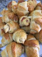 a pile of pastries sitting on top of a plate at Hotel Olivier in Três Rios