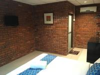 SANDY GARDEN RESORT LANGKAWIにあるベッド