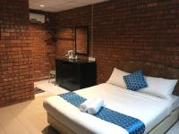 SANDY GARDEN RESORT LANGKAWIにあるベッド