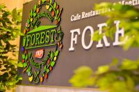 仙台APA Hotel TKP Sendai Eki Kita的恐龙动物园的标志