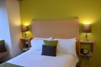 Ein Bett oder Betten in einem Zimmer der Unterkunft Canterbury Cathedral Lodge