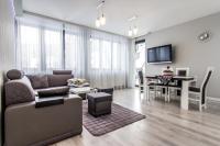Telewizja i/lub zestaw kina domowego w obiekcie Apartamenty Granitica Zakopane