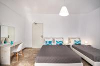 Postel nebo postele na pokoji v ubytování Villa Kavallaris & Apartments