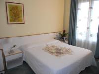 Posteľ alebo postele v izbe v ubytovaní Hotel L'Approdo