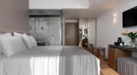 Elia Ermou Athens Hotelにあるベッド