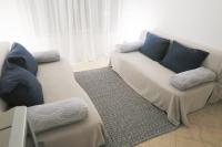A seating area at Apartament Rose