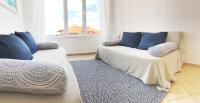 A seating area at Apartament Rose