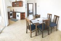 A kitchen or kitchenette at Apartament Rose