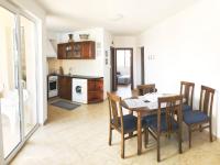 A kitchen or kitchenette at Apartament Rose