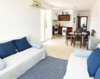 A seating area at Apartament Rose