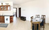 A kitchen or kitchenette at Apartament Rose