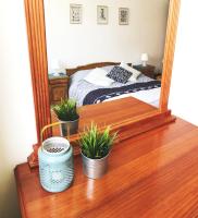 A bed or beds in a room at Apartament Rose
