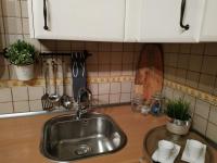 A kitchen or kitchenette at La Buhardilla de Andrea