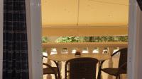 Uma varanda ou terra&ccedil;o em Corali Beach