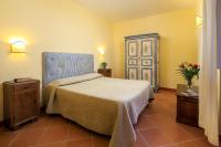 Posteľ alebo postele v izbe v ubytovaní Agriturismo Fattoria Santo Stefano