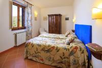 Posteľ alebo postele v izbe v ubytovaní Agriturismo Fattoria Santo Stefano