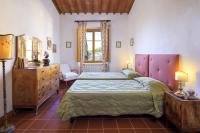 Posteľ alebo postele v izbe v ubytovaní Agriturismo Fattoria Santo Stefano