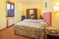 Posteľ alebo postele v izbe v ubytovaní Agriturismo Fattoria Santo Stefano