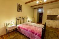 Posteľ alebo postele v izbe v ubytovaní Village Inn