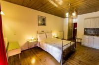 Posteľ alebo postele v izbe v ubytovaní Village Inn