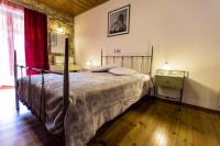 Posteľ alebo postele v izbe v ubytovaní Village Inn