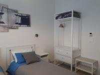 A bed or beds in a room at SoleLuna Fiera 6 Rooms