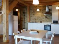 Kuchyň nebo kuchyňský kout v ubytování Apartamentos Lusarbe