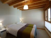 Postel nebo postele na pokoji v ubytování Apartamentos Lusarbe