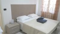 A bed or beds in a room at Villa Benedetta