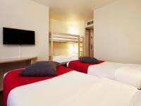 Cama o camas de una habitación en Campanile Val de France