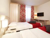 Cama o camas de una habitación en Campanile Val de France
