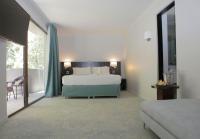 Hotel Bosque de Reñacaにあるベッド