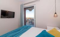 Posteľ alebo postele v izbe v ubytovaní Eolia Apartment