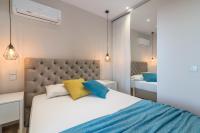Posteľ alebo postele v izbe v ubytovaní Eolia Apartment