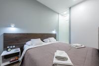 Posteľ alebo postele v izbe v ubytovaní Apartament Luxury Miedzyborska 8b
