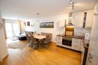Kuchnia lub aneks kuchenny w obiekcie Finest Kitzblick Golf Suites by All in One Apartments