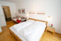 Łóżko lub łóżka w pokoju w obiekcie Finest Kitzblick Golf Suites by All in One Apartments