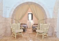A seating area at Trullo Cime Bianche