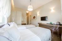 Posteľ alebo postele v izbe v ubytovaní Hotel Jakubus