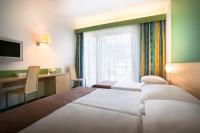 Ein Bett oder Betten in einem Zimmer der Unterkunft Remisens Hotel LUCIJA
