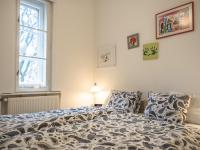 Posteľ alebo postele v izbe v ubytovaní Artissimo Apartments