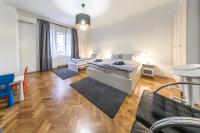 Posteľ alebo postele v izbe v ubytovaní Artissimo Apartments