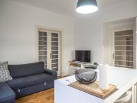 Televízia a/alebo spoločenská miestnosť v ubytovaní Artissimo Apartments
