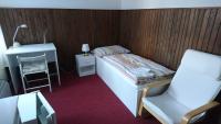 Postel nebo postele na pokoji v ubytování Hotel Šrejber