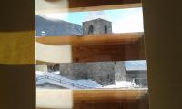 a view from a window of a building in the snow at Hotelski in Verbier