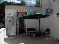 A patio or other outdoor area at L'attico di Val.